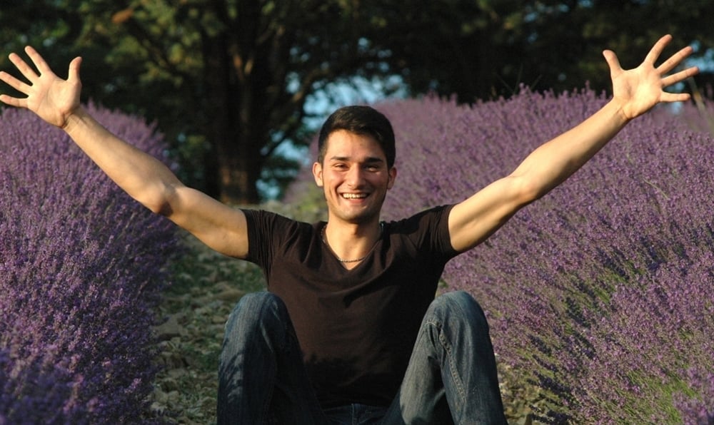 Alessandro Domini, a Pharmacy student applied to the formulation of food supplements and perfumes in the midst of rows of flowering lavender