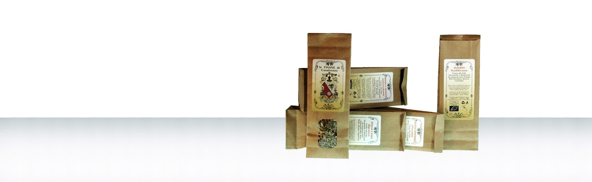 On a bright light top, 5 paper bags for herbal teas with organic dried herbs; heraldic label of Casalvento