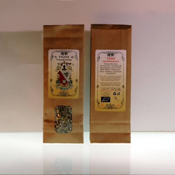 Kraft bag with inspection window of 50g herbal tea cut. Front and rear view with content inspection portholes. Casalvento heraldic label